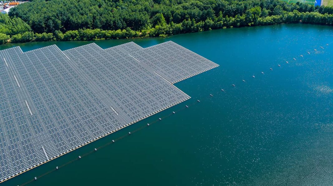 Home 4 Aerial view of Floating solar panels cell platform system on the lake